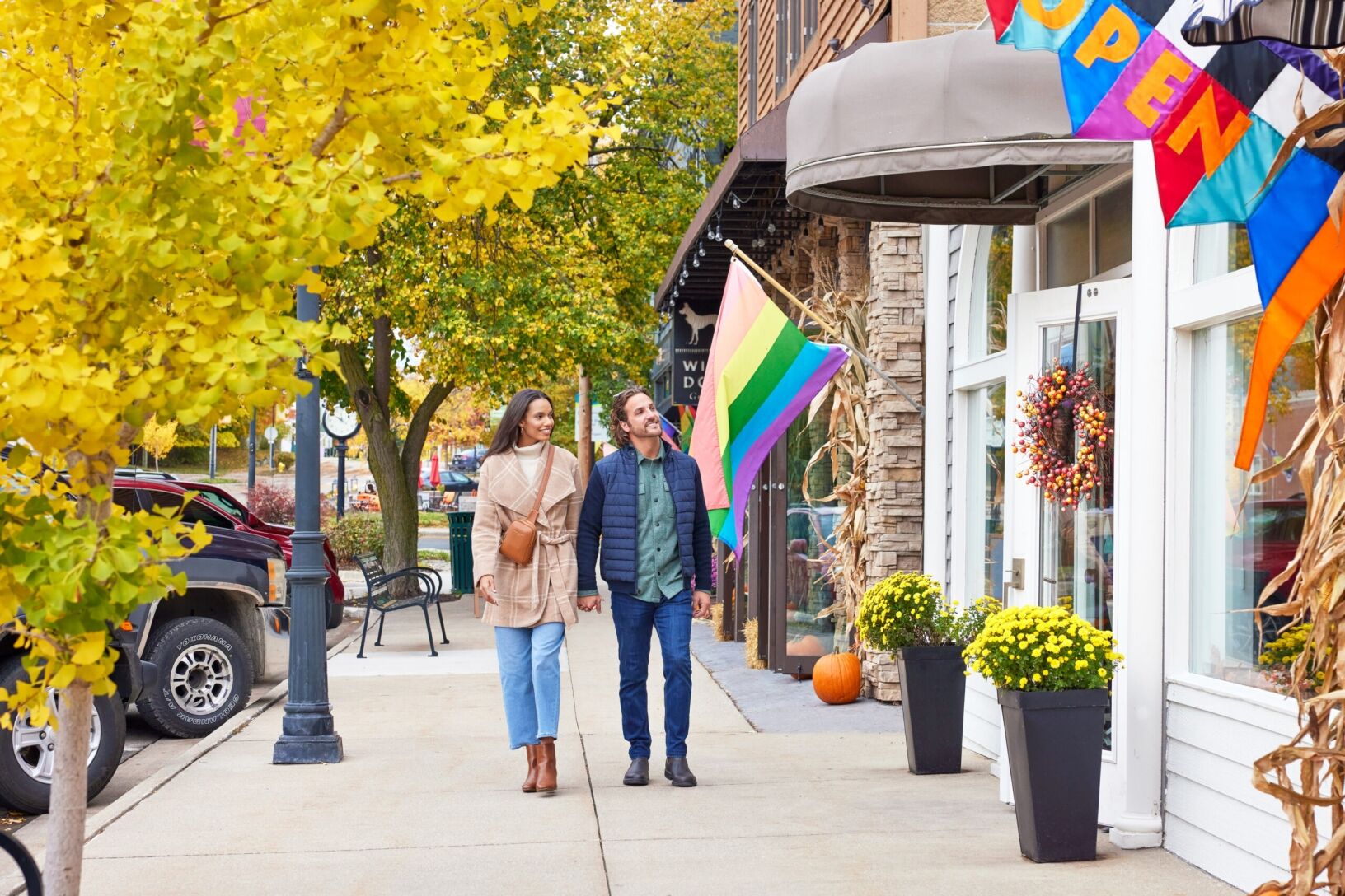 A couple walking in downtown Douglas during the fall.