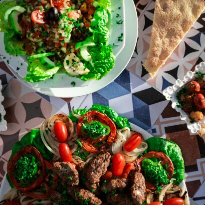 Moroccan dishes served on a patterned table