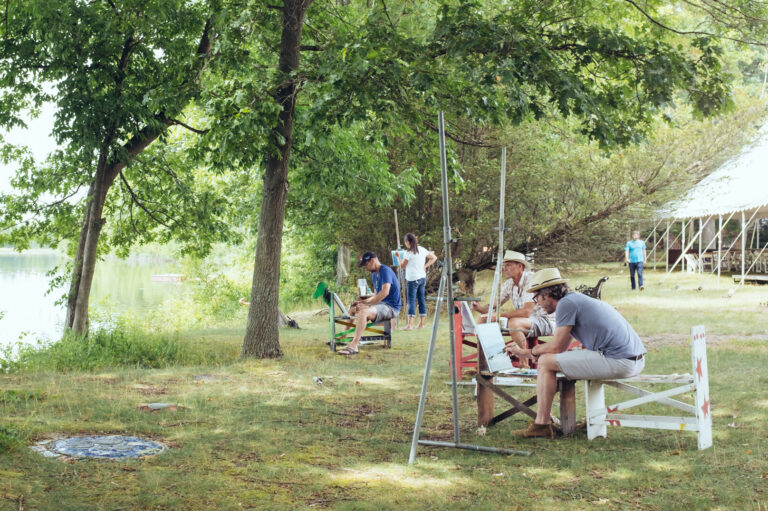 Students painting by the Kalamazoo River at Ox-Bow, School of Art and Artists’ Residency.