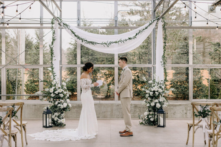 A wedding in a greenhouse at Ivy House.