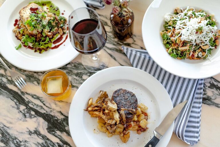 A spread of small plates and drinks at Ladybird.