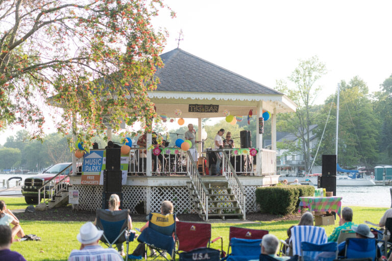 People attending a concert at Wicks Park.