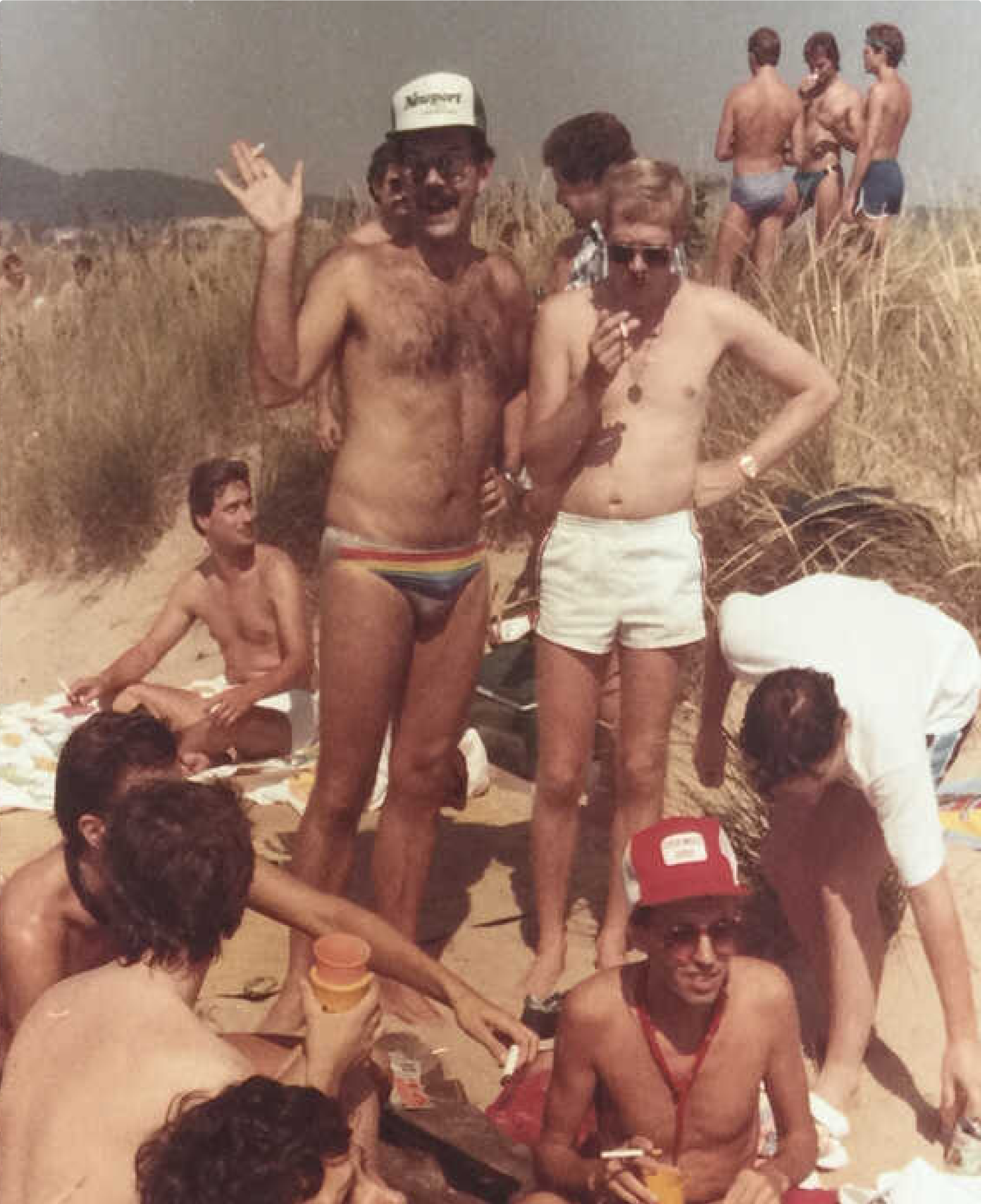 A historic image of men on a beach.