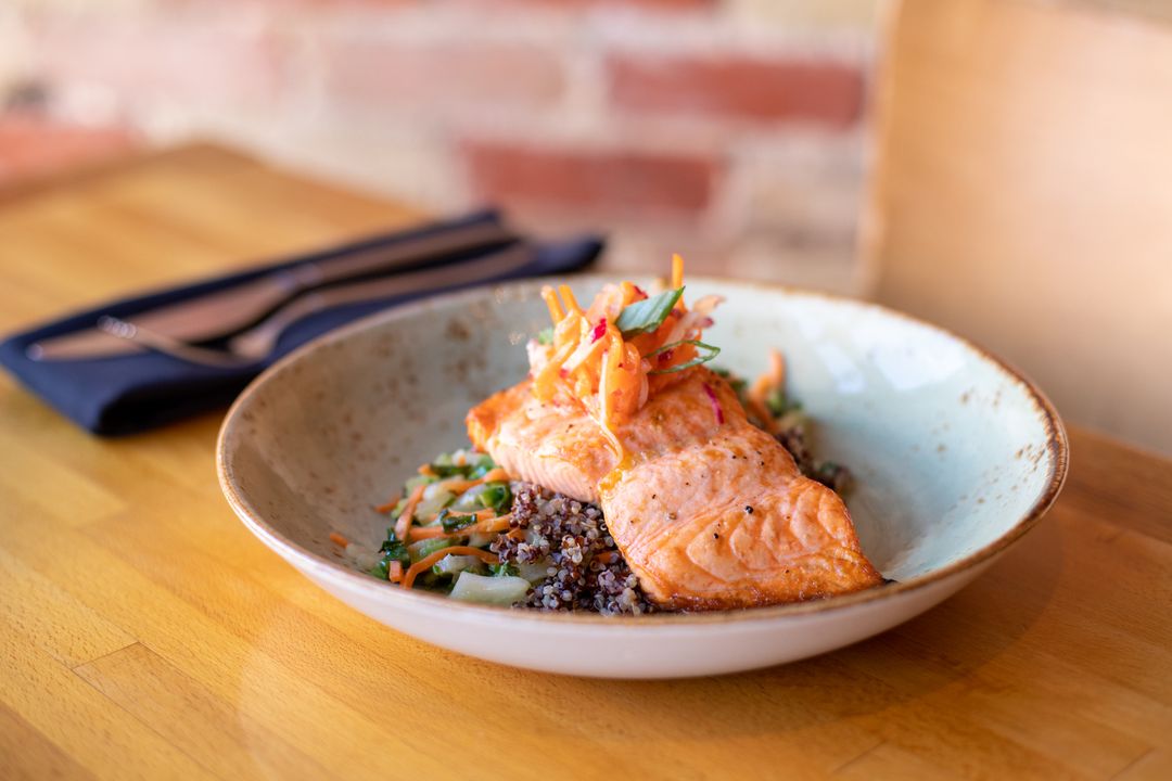 Plate of salmon and quinoa at Salt of the Earth